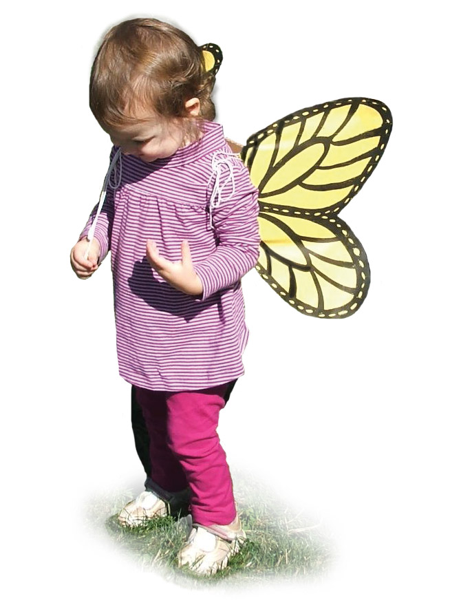 child wearing butterfly wings